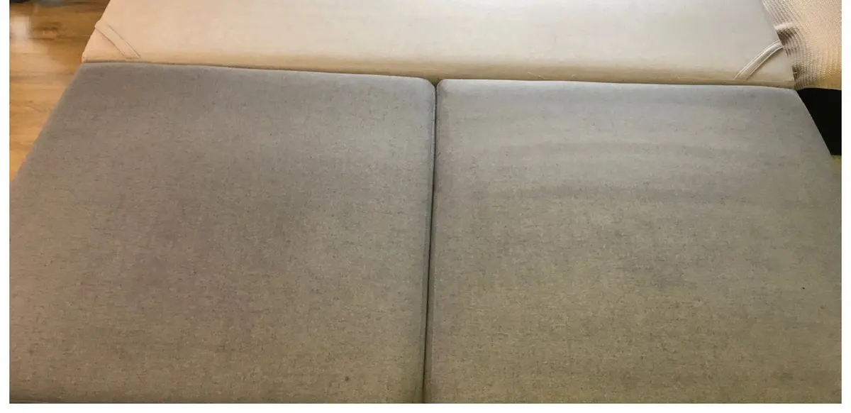 Szara sofa po praniu ekstrakcyjnym — tkanina bez plam, kolor odzyskany. Pranie kanapy Tychy, SofaGo